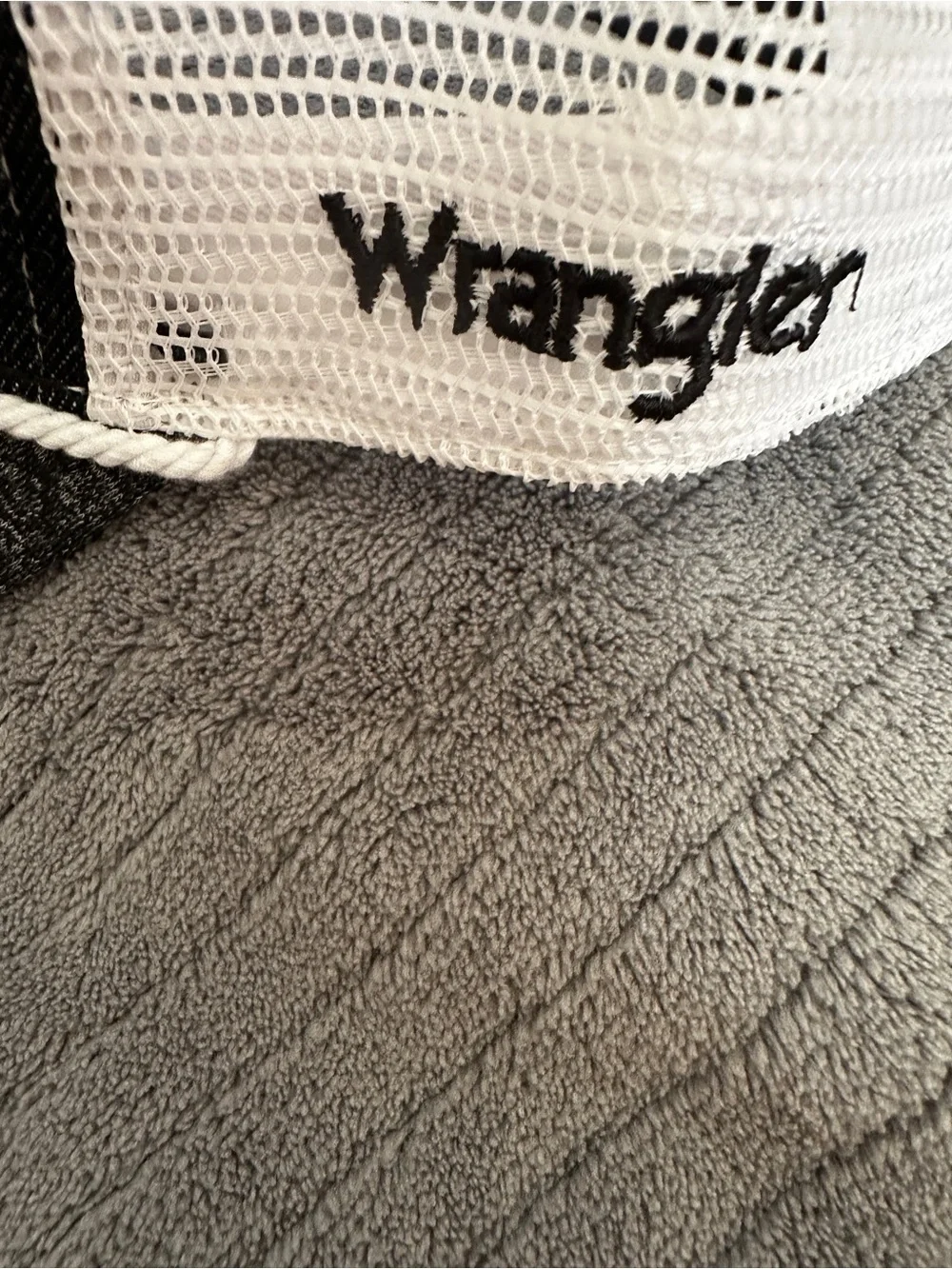 Wrangler Black and White Mesh Trucker Hat- BUCKING Horse- Wyoming